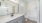 a bathroom with a large mirror