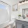 a bathroom with a tall window